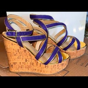 Strappy gold and purple cork wedges.